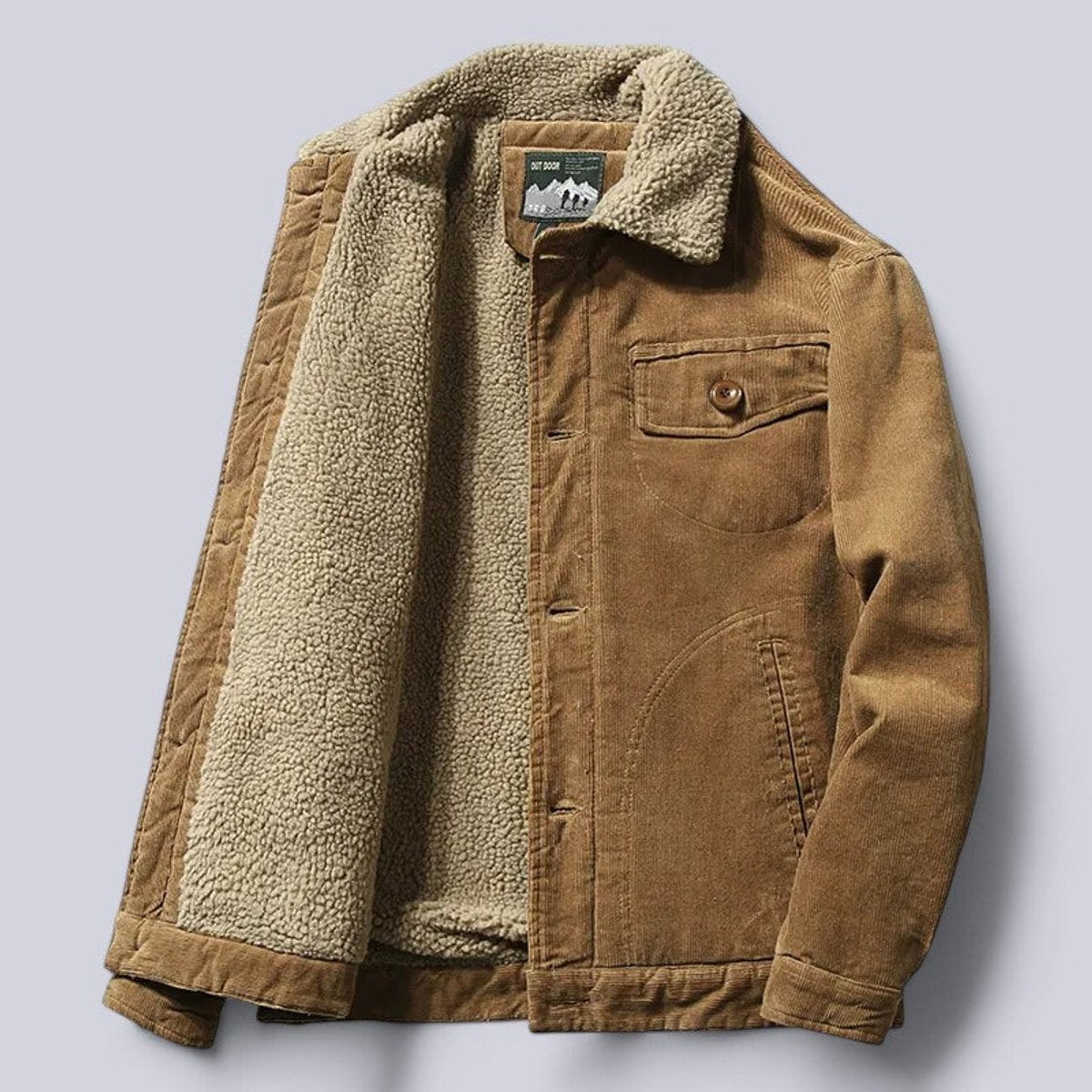 Tan corduroy jacket with sherpa fleece lining and buttoned chest pocket