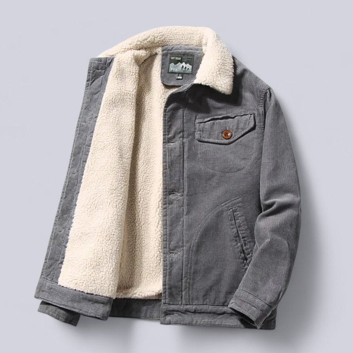 Grey corduroy jacket unbuttoned revealing cream sherpa fleece interior lining