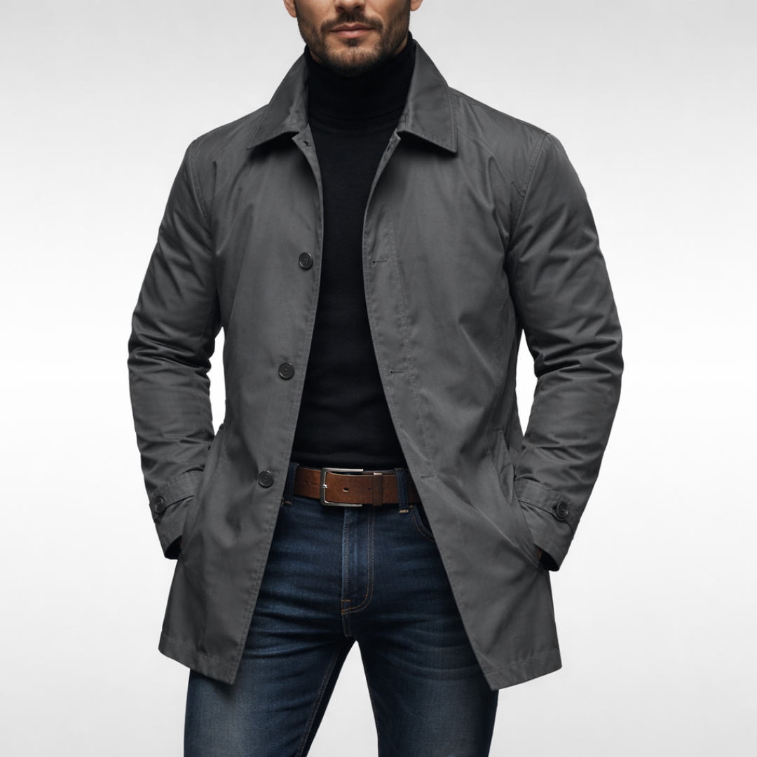 Charcoal grey mac coat featuring classic collar and button fastening