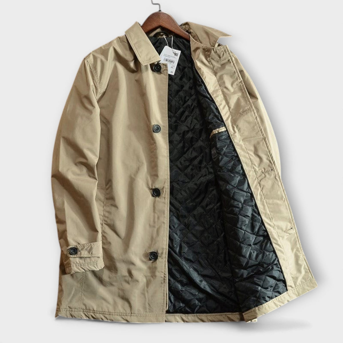 Beige mac coat displayed on hanger showing full button placket