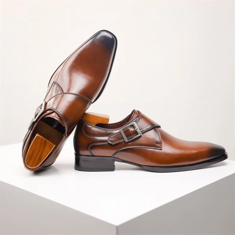 Side profile of brown leather monk strap dress shoe with wooden shoe tree