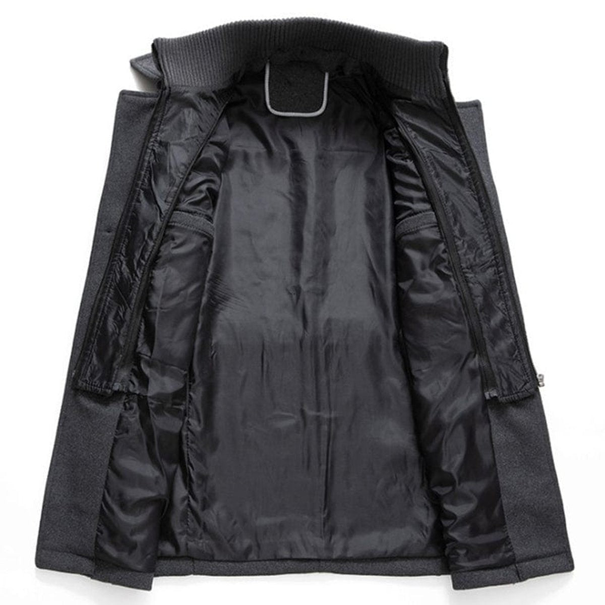 Interior lining view of black wool overcoat showing zipped inner pockets