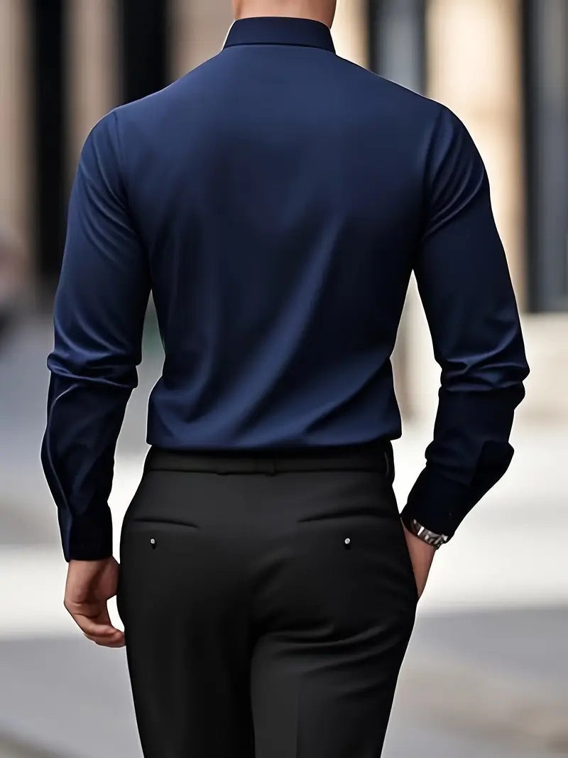 Rear view of navy blue shirt showing smooth back panel