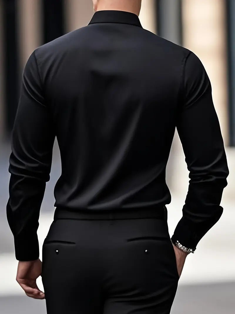 Back view of black button-up shirt with structured shoulders