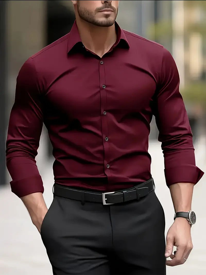 Burgundy button-up shirt worn with black tailored trousers