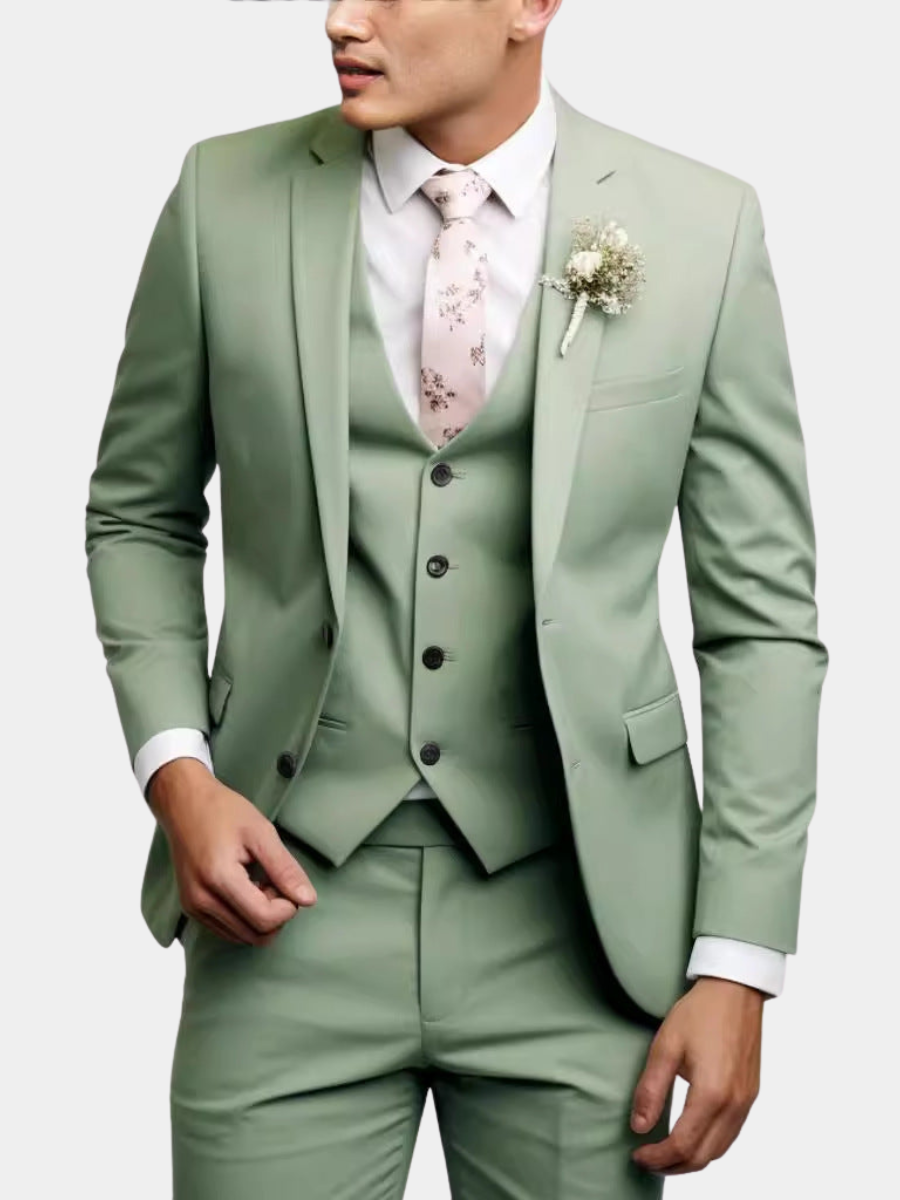 Sage green three-piece suit with notch lapel and floral tie for grooms