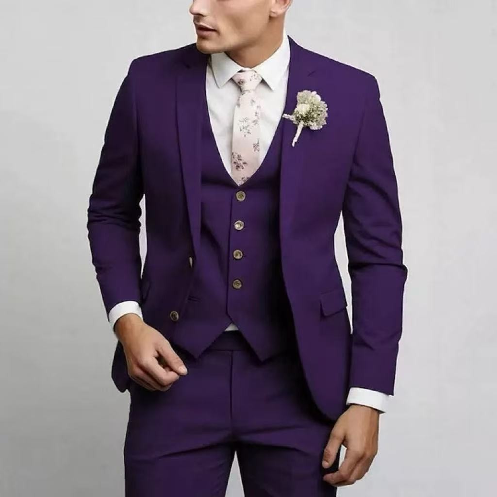 Deep purple three-piece suit with gold-tone buttons and tie