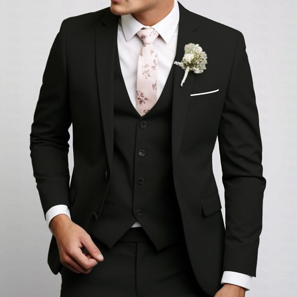 Black slim-fit three-piece suit with white pocket square detail