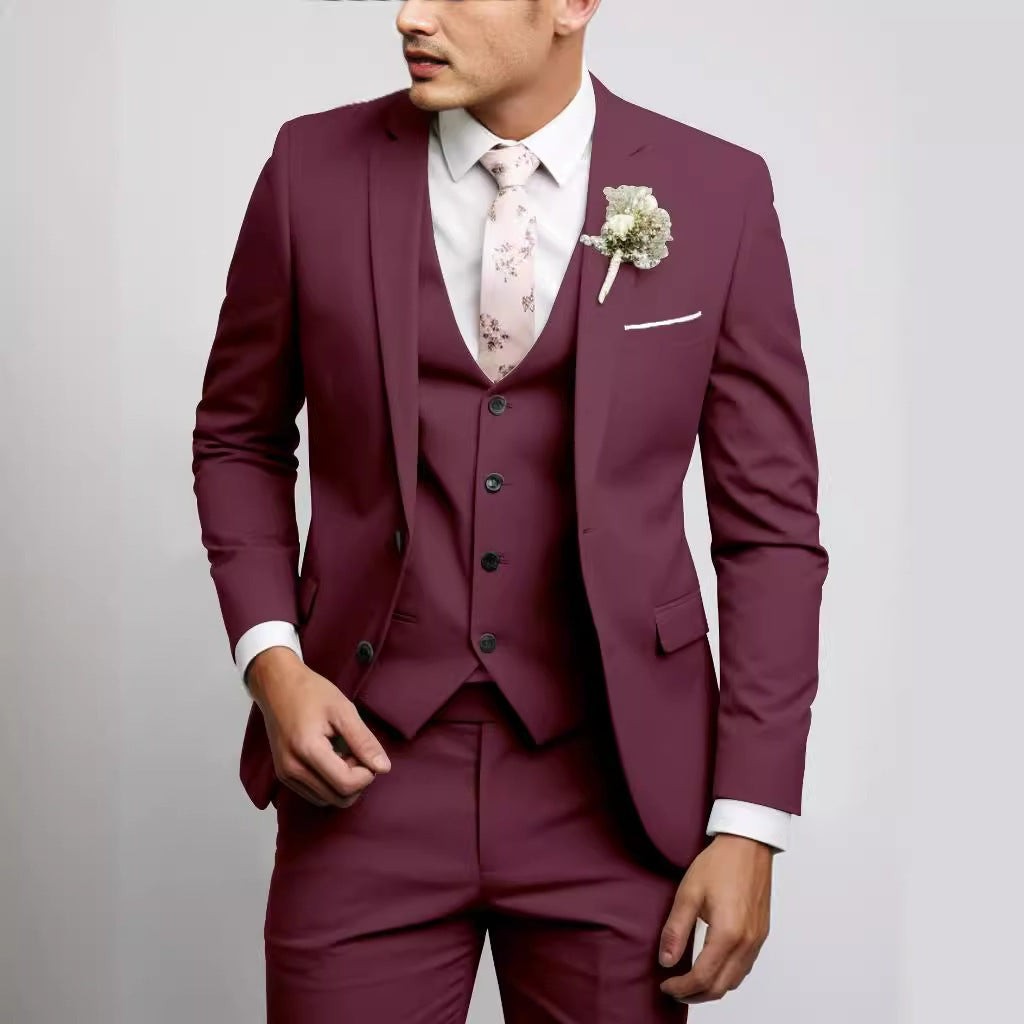 Burgundy slim-fit three-piece suit with pink floral necktie