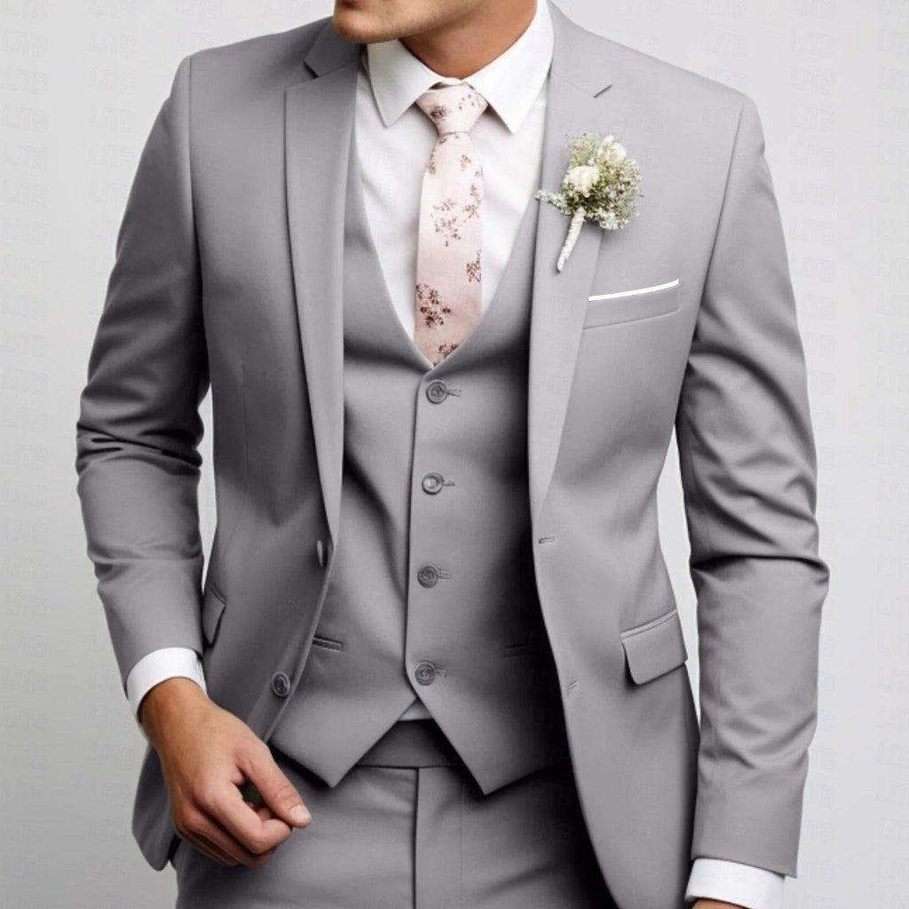 Light grey three-piece suit with waistcoat and blush floral tie