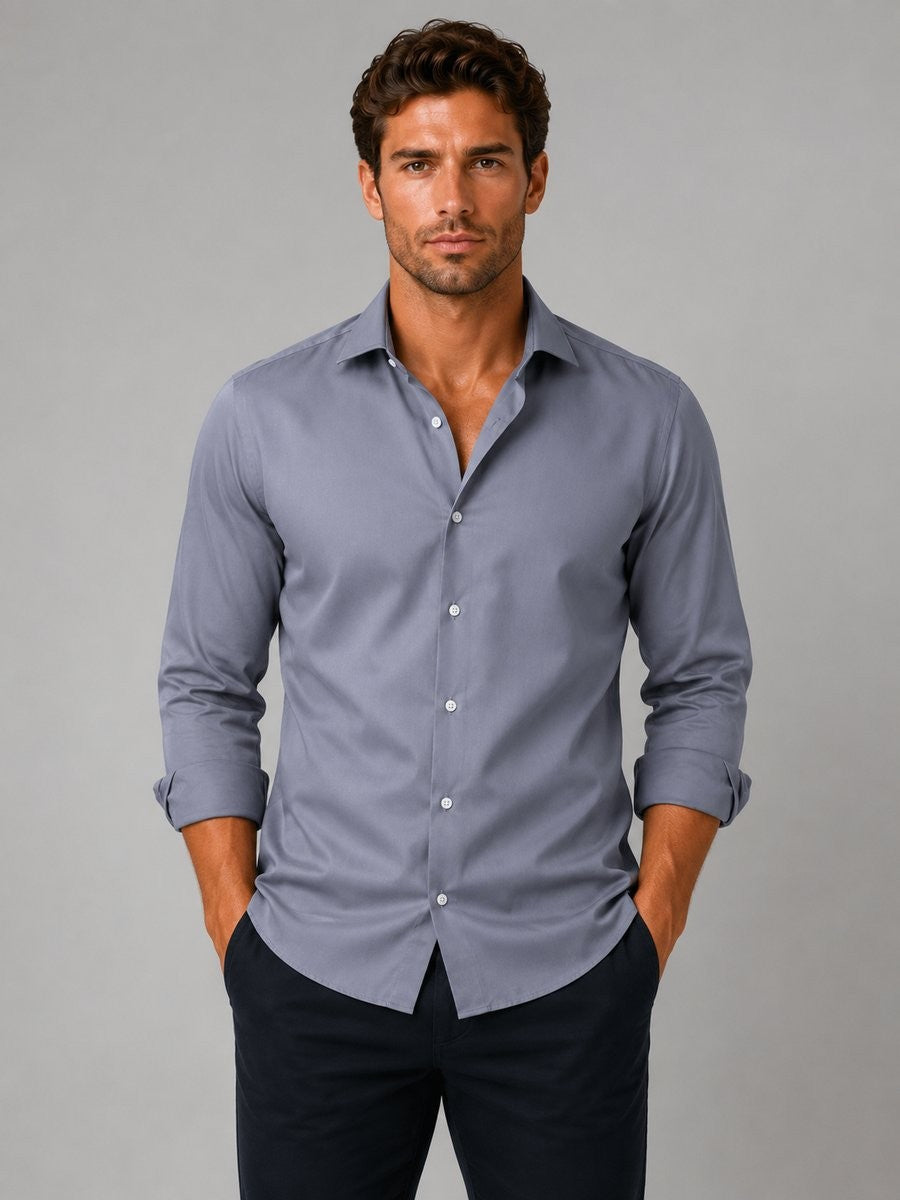 Slate grey slim-fit dress shirt worn with rolled sleeves and navy chinos
