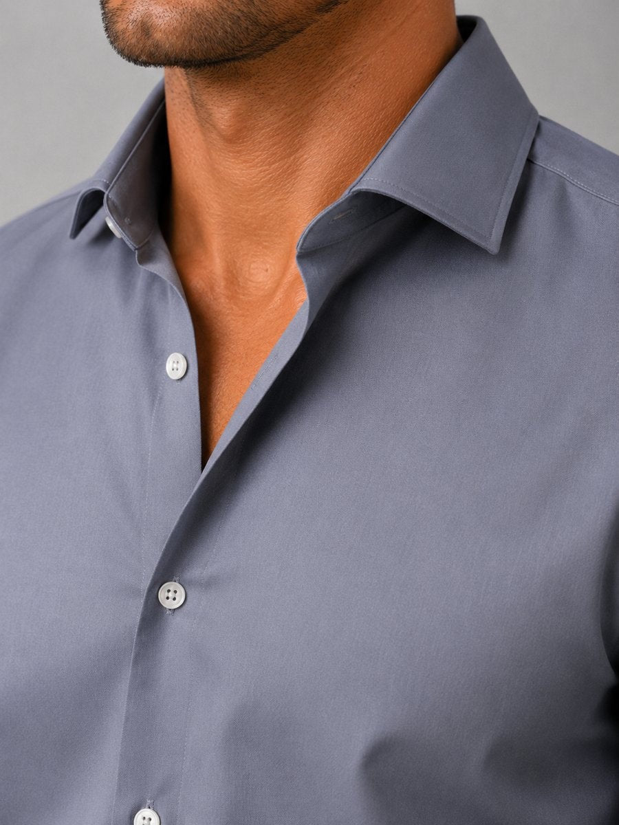 Close-up of grey dress shirt collar and button placket detail