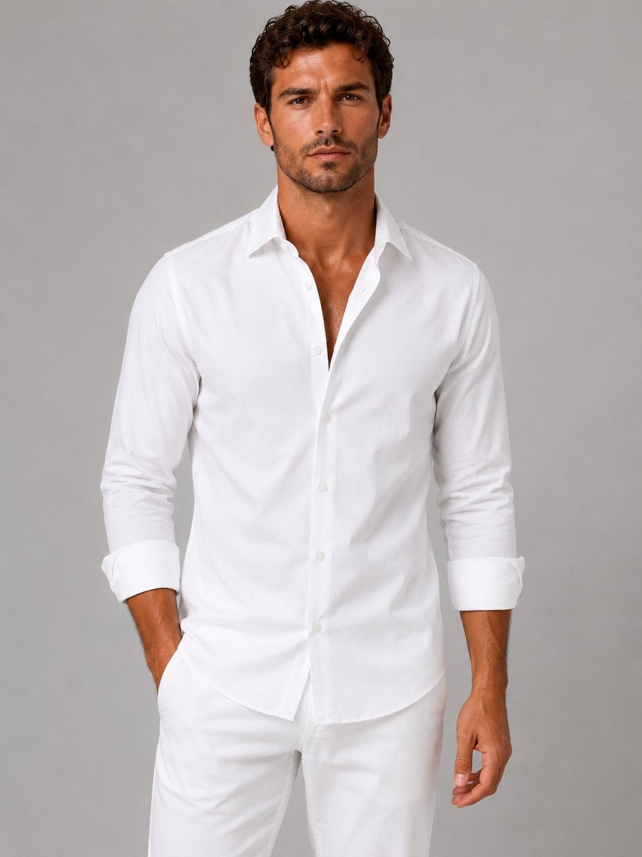 White slim-fit long-sleeve dress shirt styled with matching white trousers