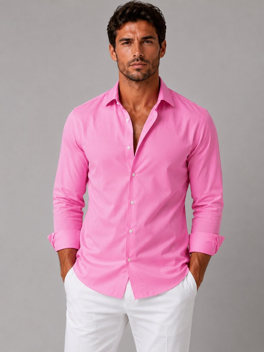 Bright pink slim-fit dress shirt paired with white tailored trousers