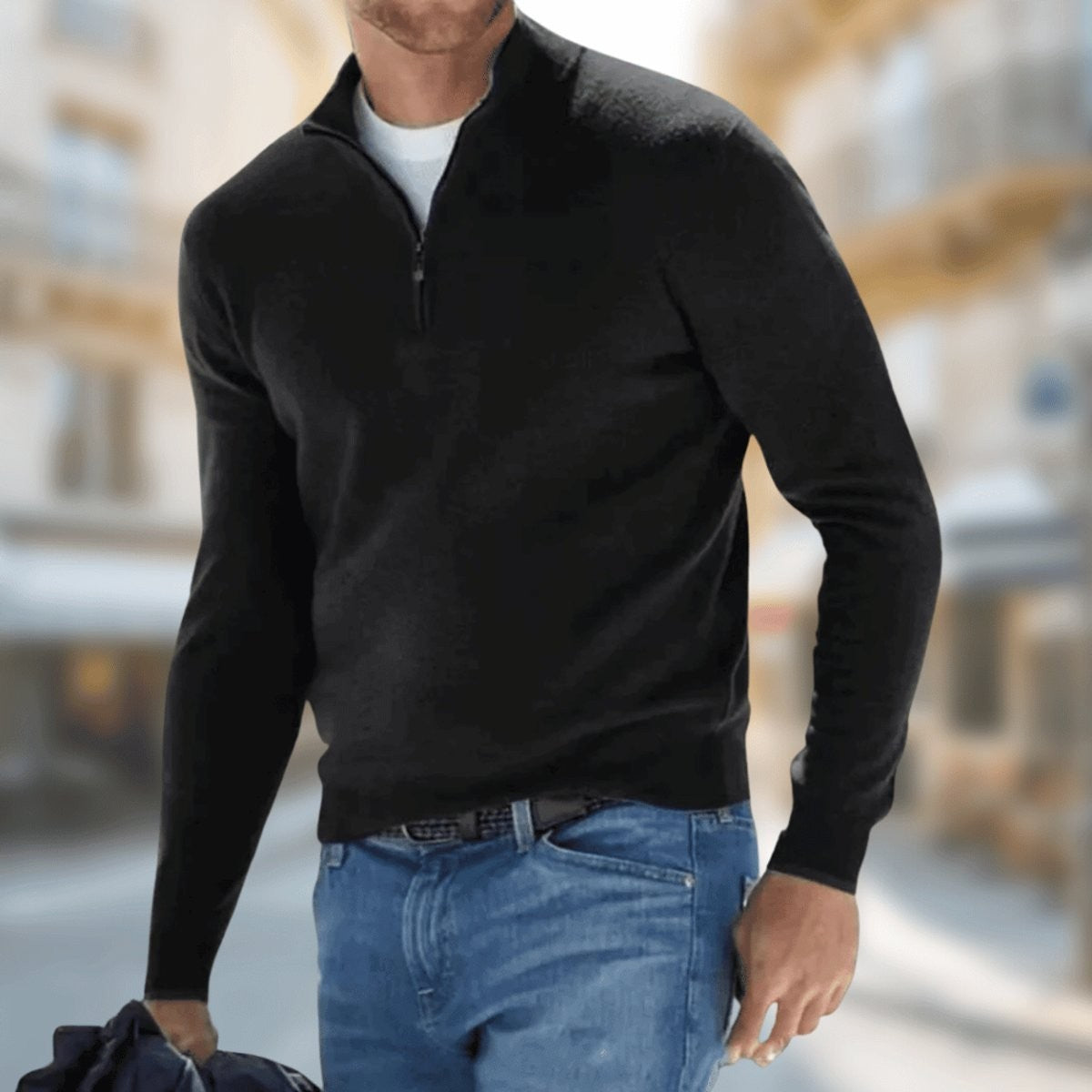 Black slim-fit quarter-zip jumper paired with jeans and a white t-shirt