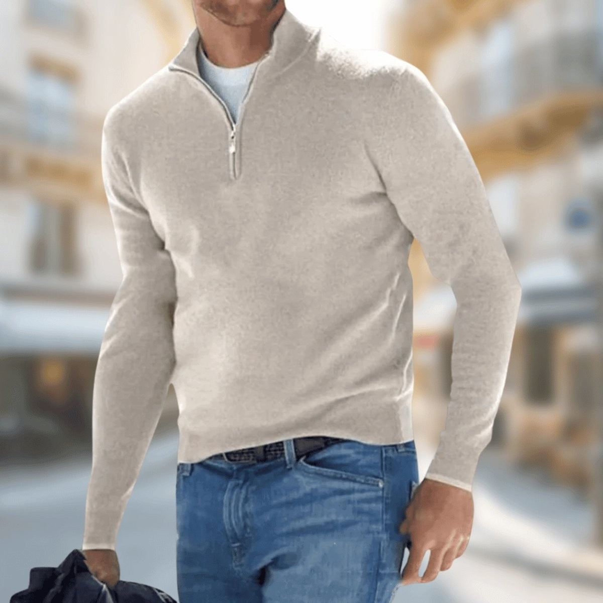 Oatmeal quarter-zip jumper in fine knit, worn over a light t-shirt