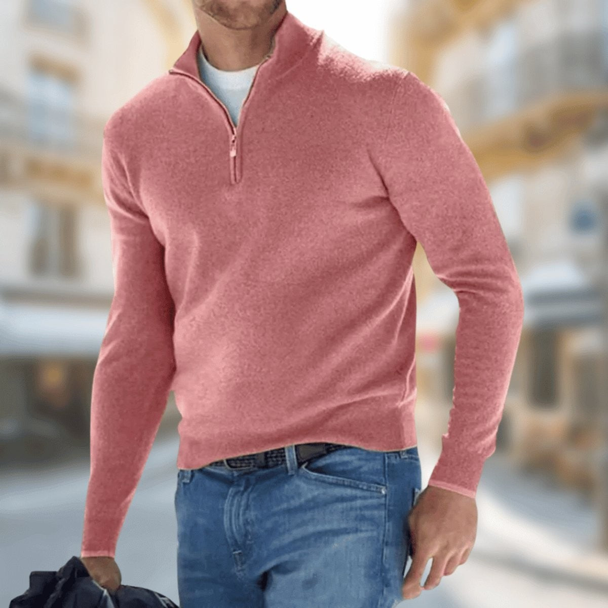 Coral pink quarter-zip fine-knit jumper styled with blue denim jeans