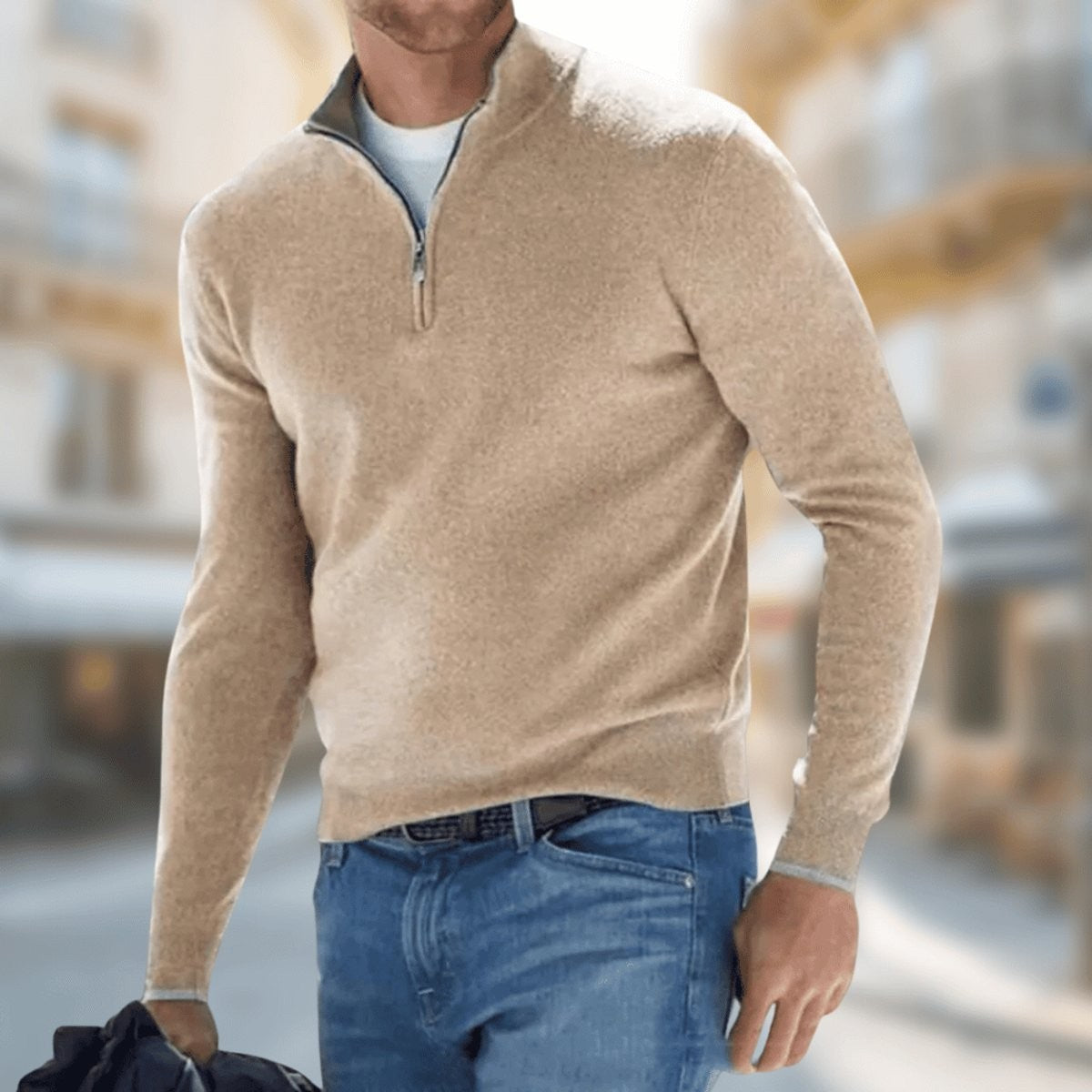 Beige slim-fit quarter-zip pullover with contrast trim, worn with jeans