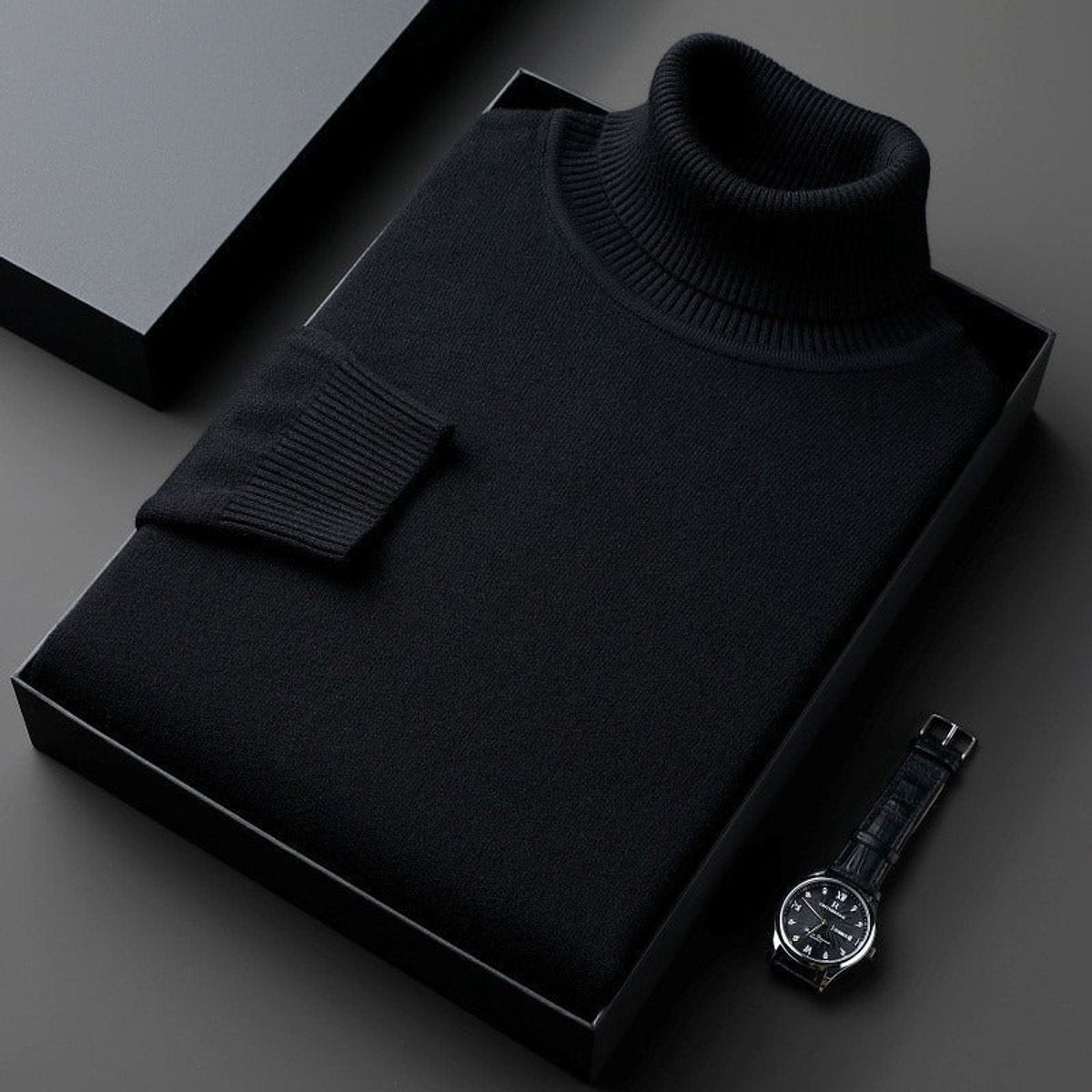 Black slim-fit turtleneck jumper folded with ribbed knit detailing