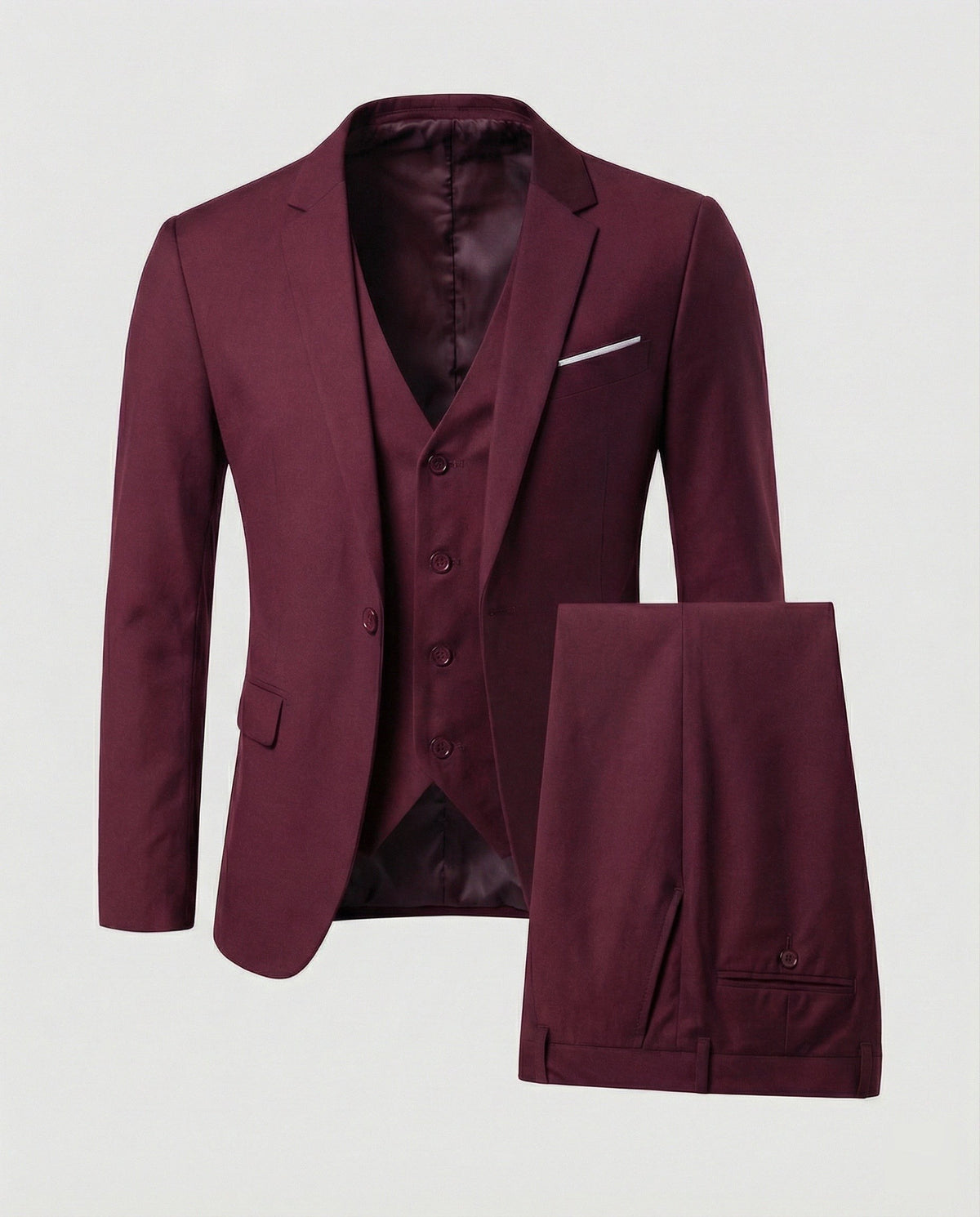 Light blue three-piece wool blend suit laid flat with pocket square