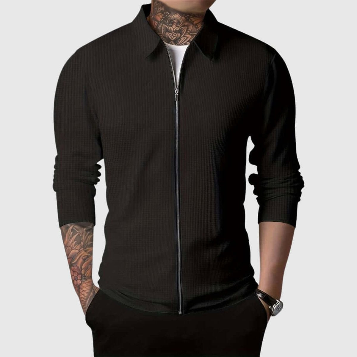 Black waffle-knit full-zip bomber jacket styled with a white T-shirt