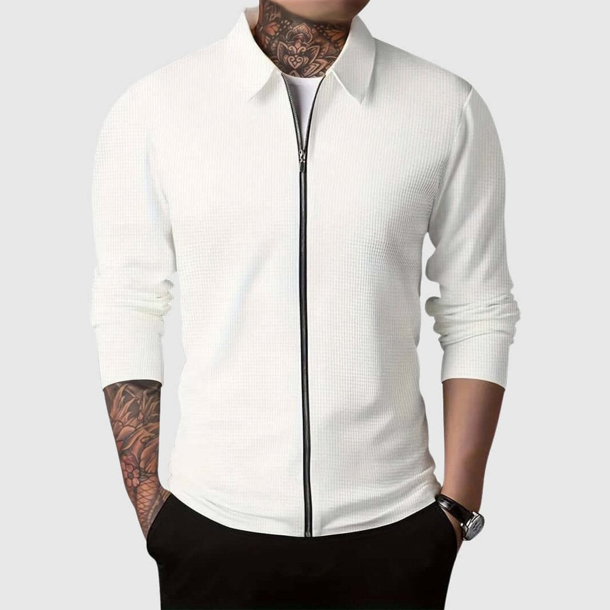 White waffle-knit zip-up collared jacket layered over a plain white tee