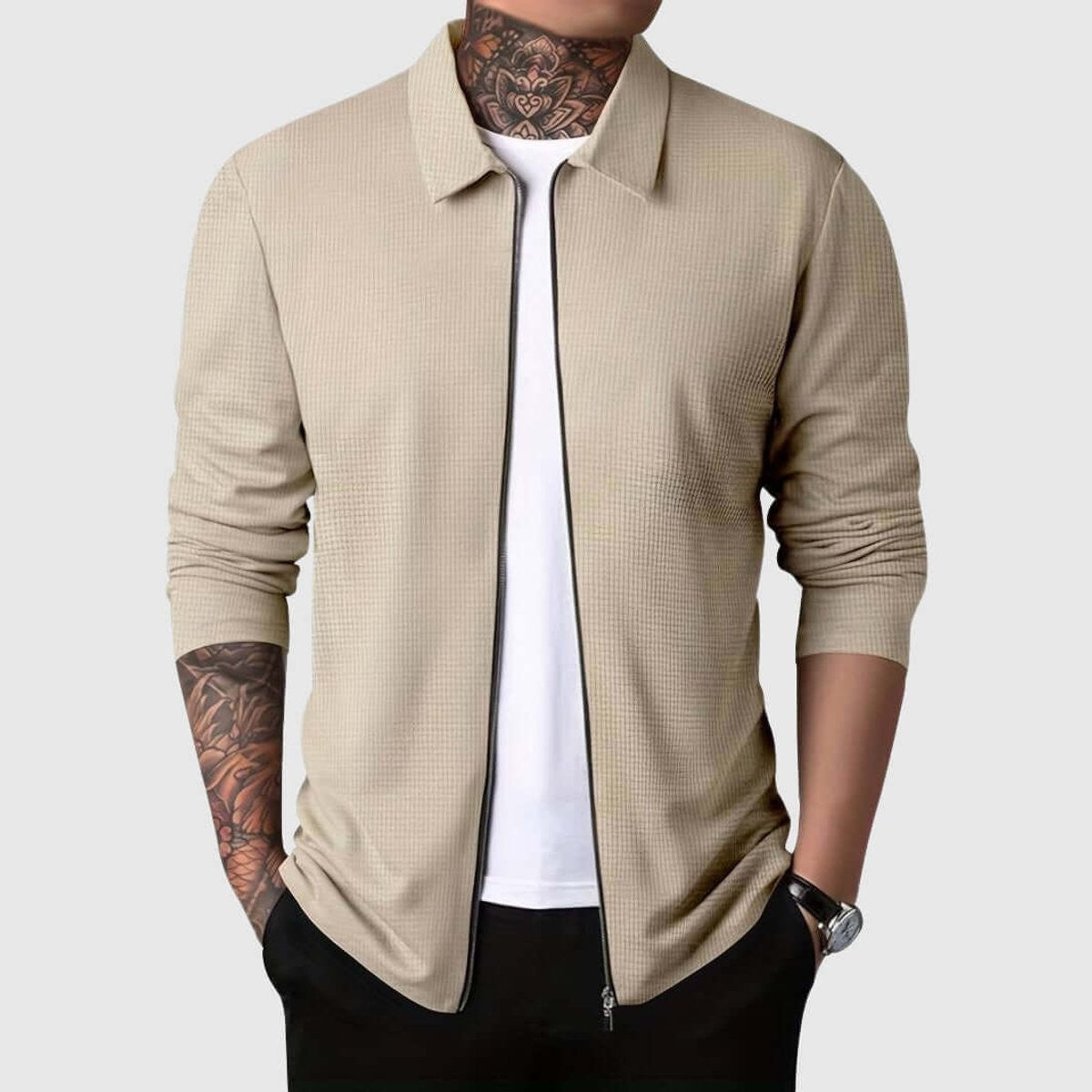 Beige textured zip-up shacket worn open over a white T-shirt