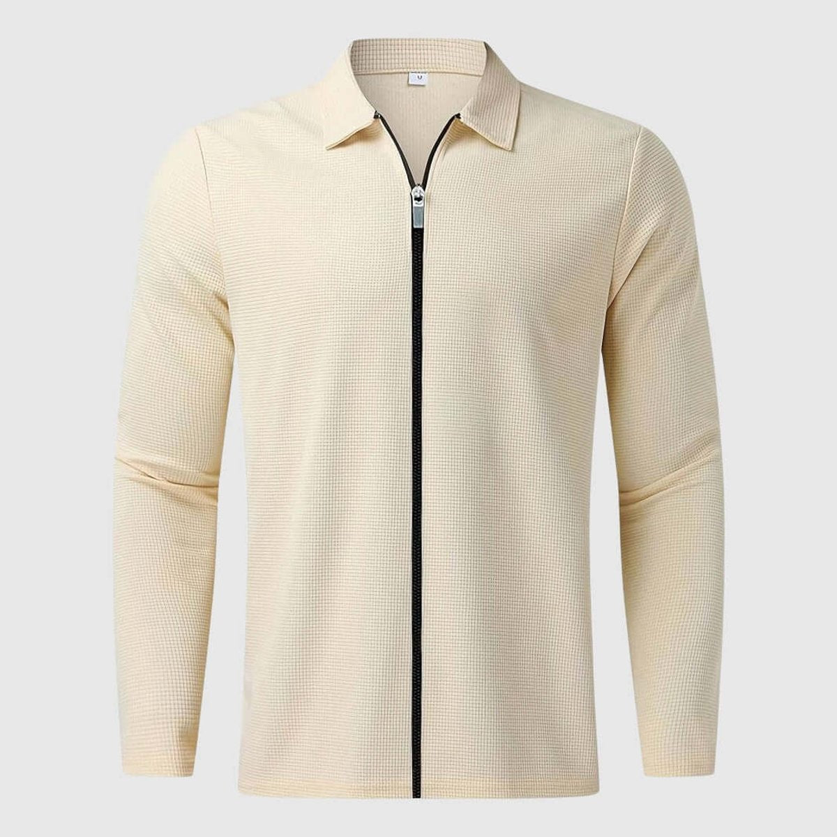 Front view of beige waffle-knit zip-up jacket laid flat, collar detail visible