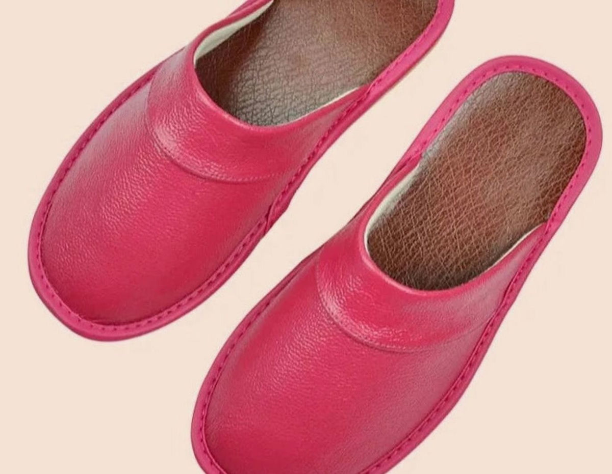 Hot pink leather slip-on slippers with soft rounded toe