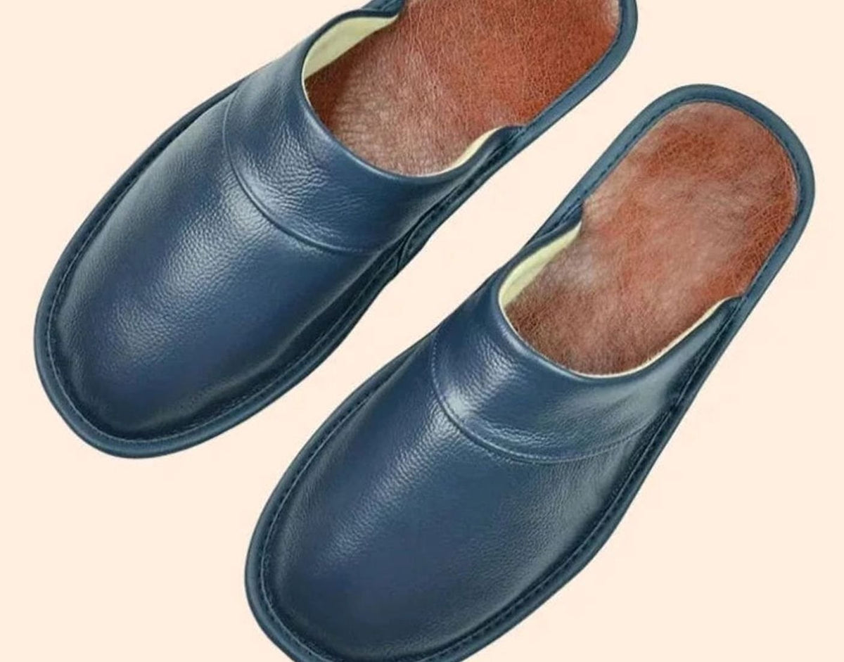 Navy blue leather slip-on slippers with contrasting insole finish