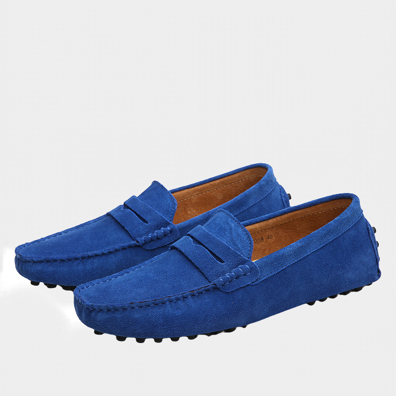 Cobalt blue suede penny loafers with tan leather interior