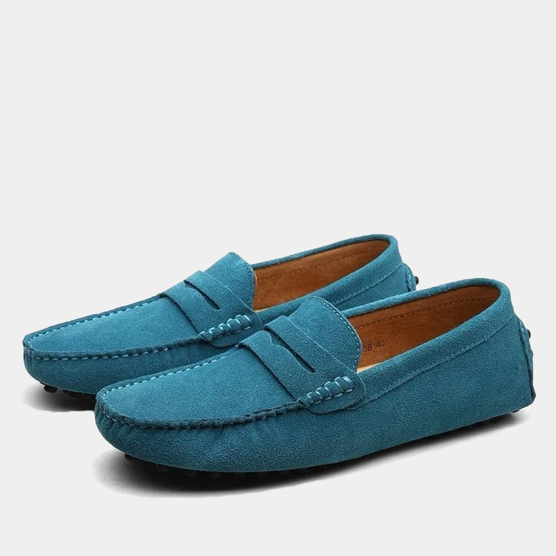 Teal suede slip-on loafers with contrast stitching and driving sole