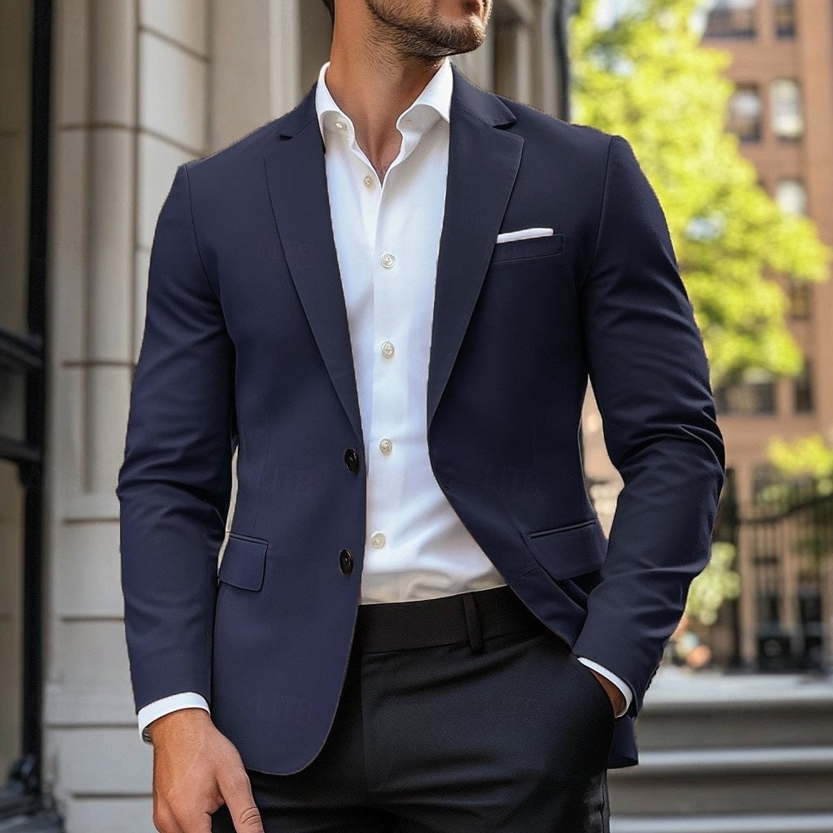 Navy single-breasted blazer paired with white shirt for a tailored fit