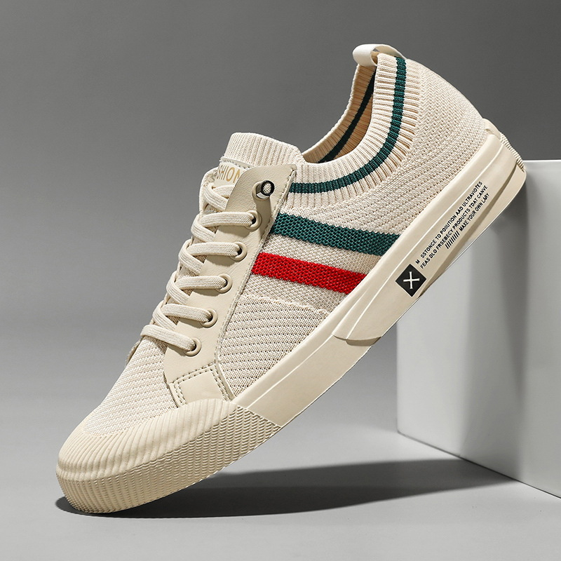 Beige mesh sneaker featuring striped side panel and lace fastening