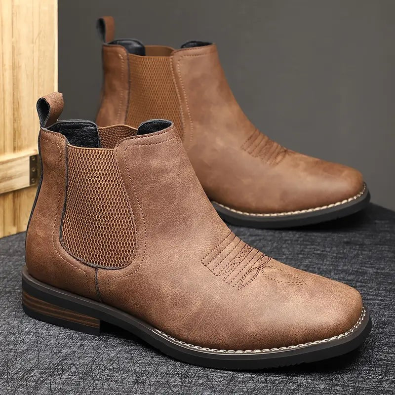 Brown leather ankle boots with elasticated panels displayed together