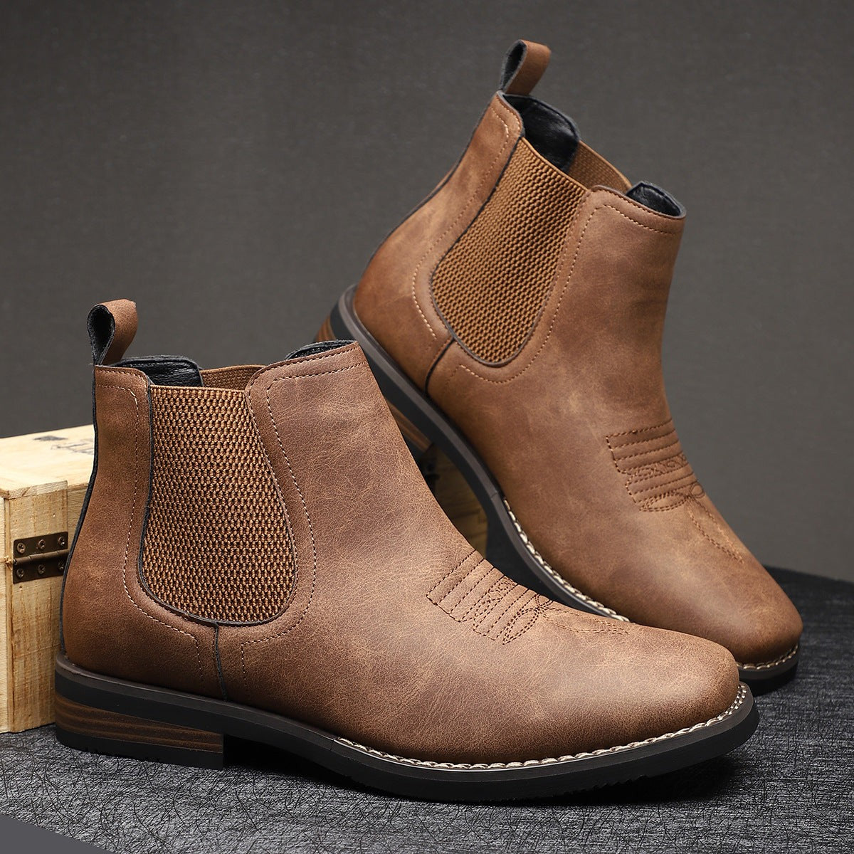 Pair of brown leather Chelsea boots with contrast stitched toe design