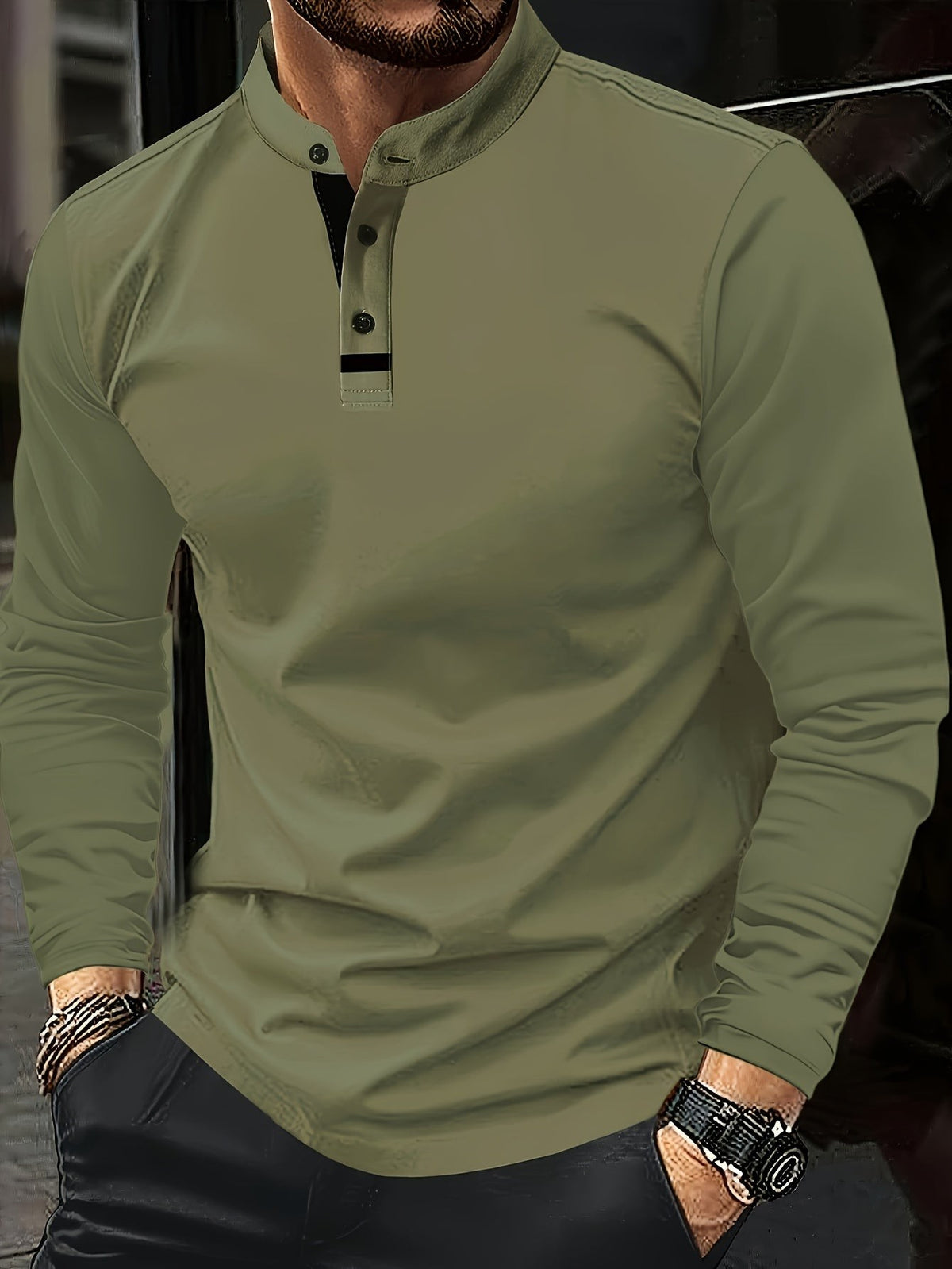 Olive green long-sleeve polo shirt featuring stand-up collar and buttons