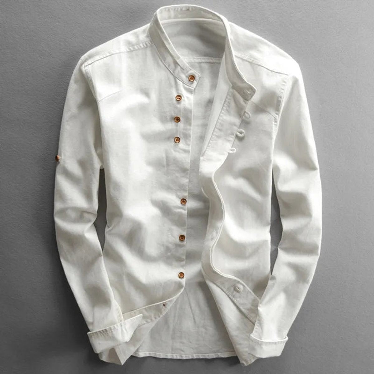 White men's Henley linen shirt featuring stand collar and long sleeves