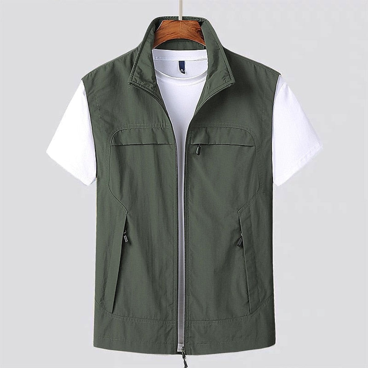 Khaki green lightweight utility vest with zip pockets and stand-up collar