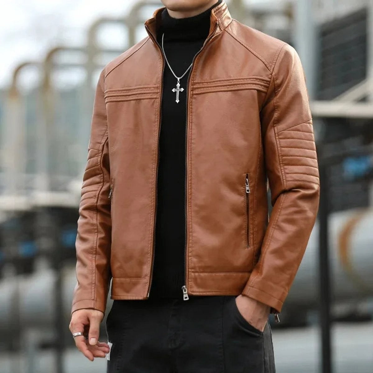 Tan leather zip-up jacket with stand collar and stitched panel detailing