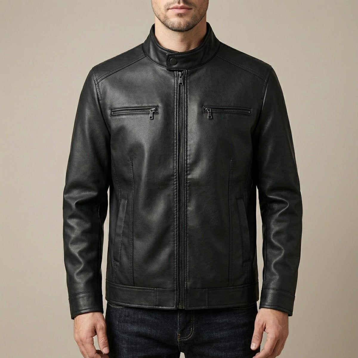 Man modelling black leather biker jacket with zip pockets and stand collar