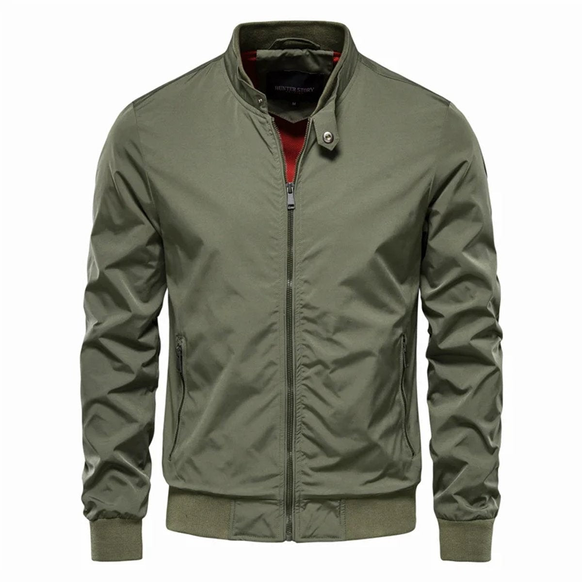 Olive green zip-up bomber jacket with ribbed cuffs and red inner lining