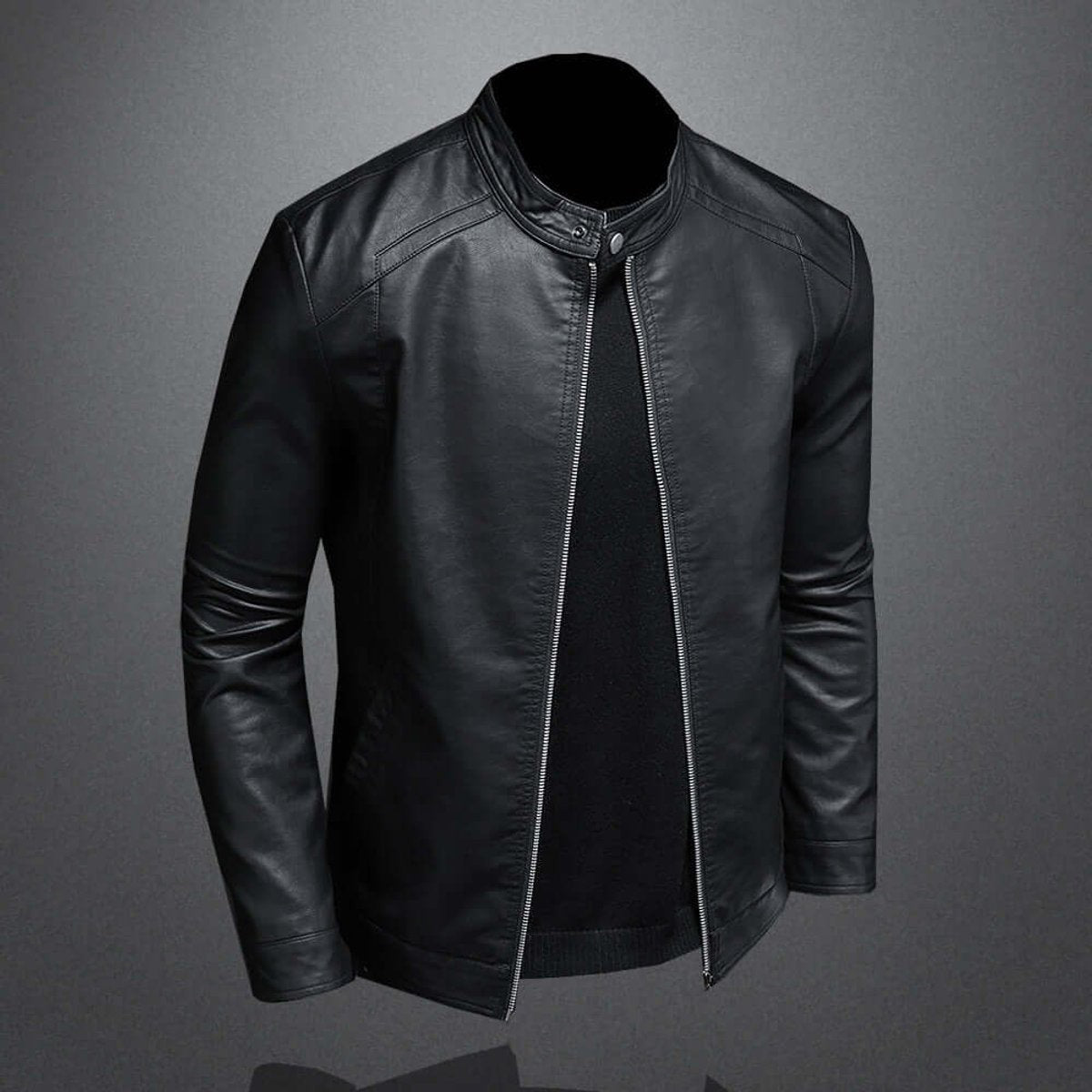 Black moto bomber jacket in faux leather, side angle showing zip and slim fit