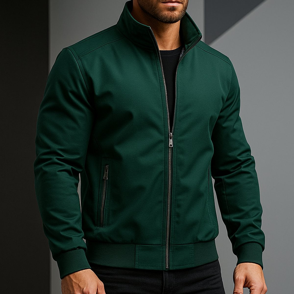 Man wearing forest green bomber jacket with high collar and zip fastening