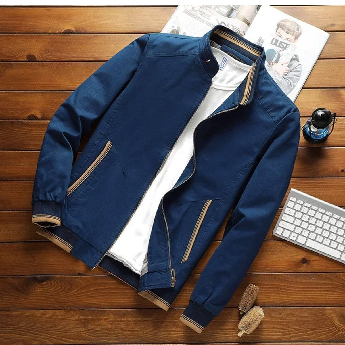 Navy blue bomber jacket with ribbed cuffs and zip-up front