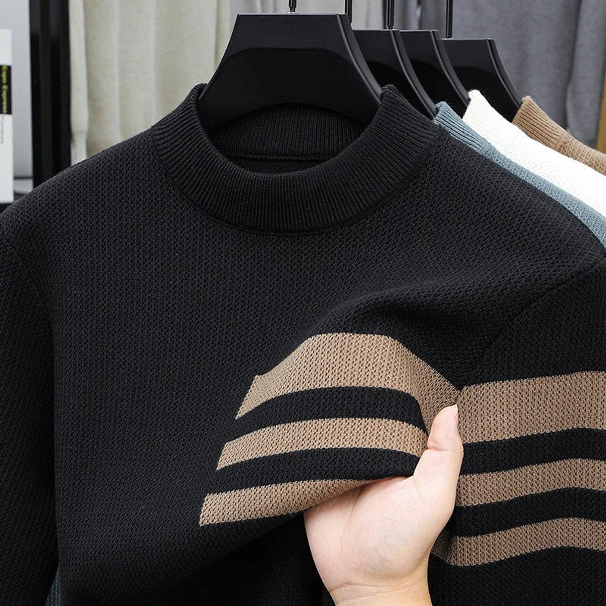 Black striped crewneck jumper with contrasting camel stripes on sleeve
