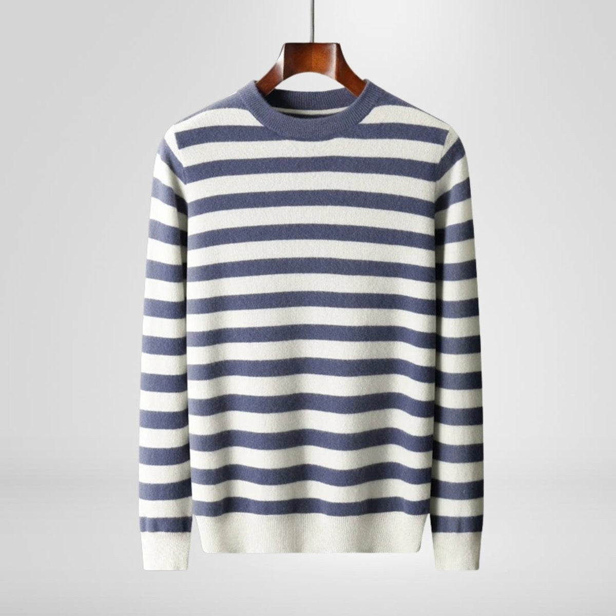 Navy and cream striped jumper on hanger with ribbed crew neck