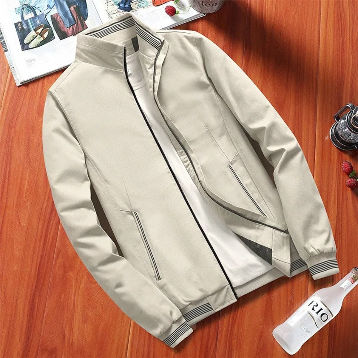 Stone-coloured wind-resistant bomber jacket with striped ribbed cuffs and collar