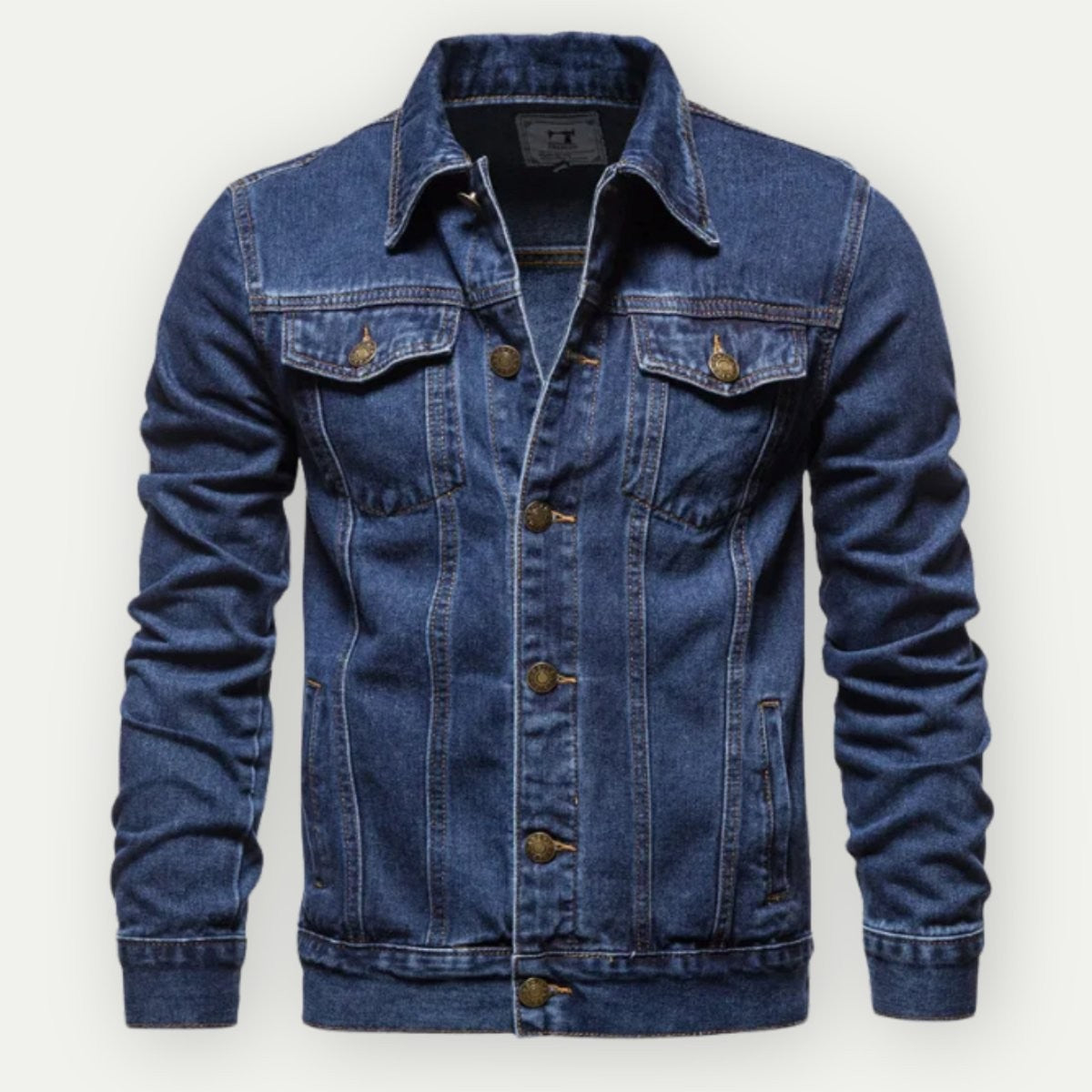 Men's mid-blue denim jacket featuring twin flap pockets and structured fit