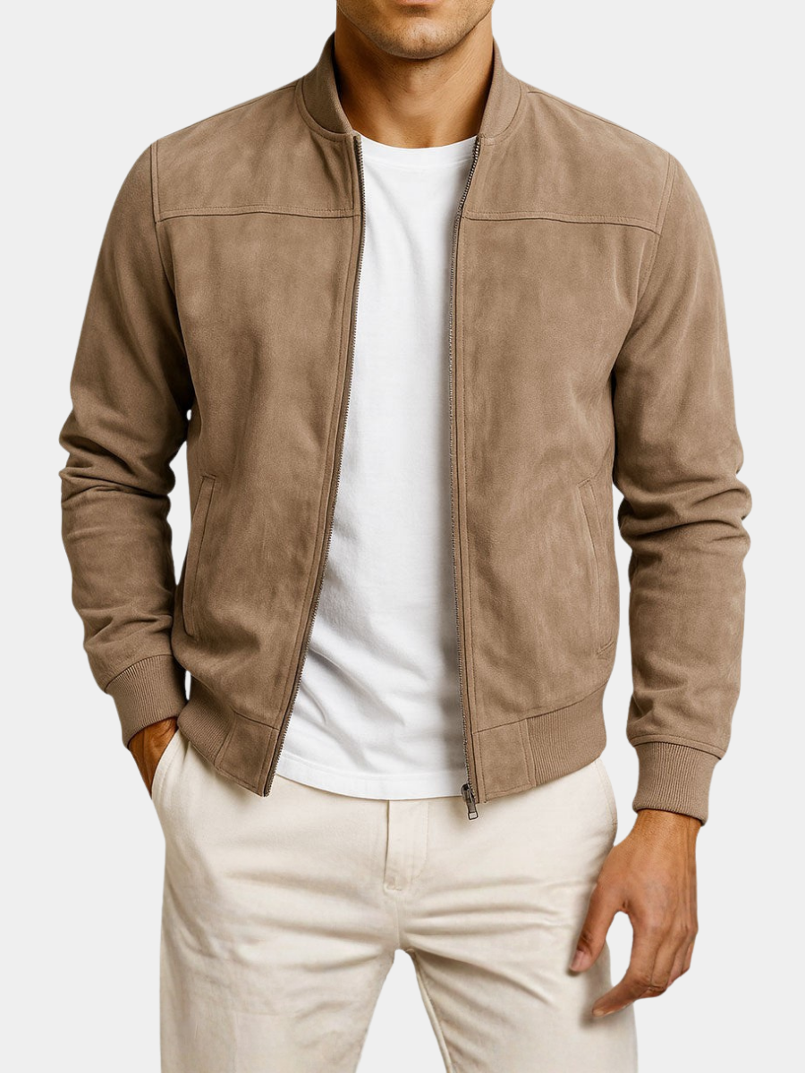 Taupe suede bomber jacket worn open over a white t-shirt